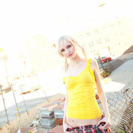 Hot upskirt pics by a sexy blond teen-01